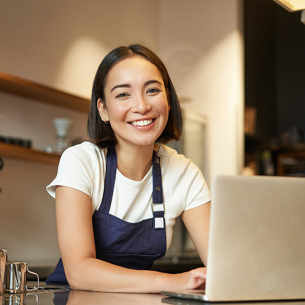 bigstock-Enthusiastic-Asian-Girl-In-Caf-467341295