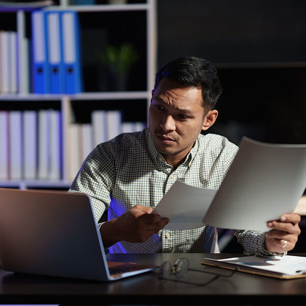 bigstock-Stressed-Business-Man-Working-463791189