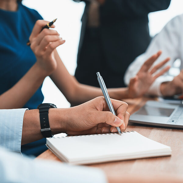 bigstock-Secretary-Taking-Notes-On-Note-475916767