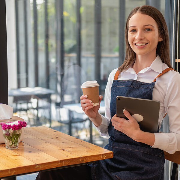 bigstock-Portrait-Of-A-Woman-A-Coffee-472852607