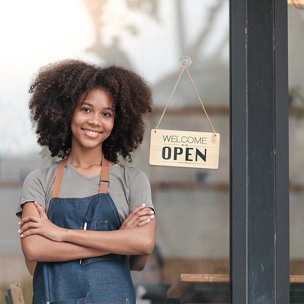 bigstock-Successful-African-Woman-In-Ap-472788903