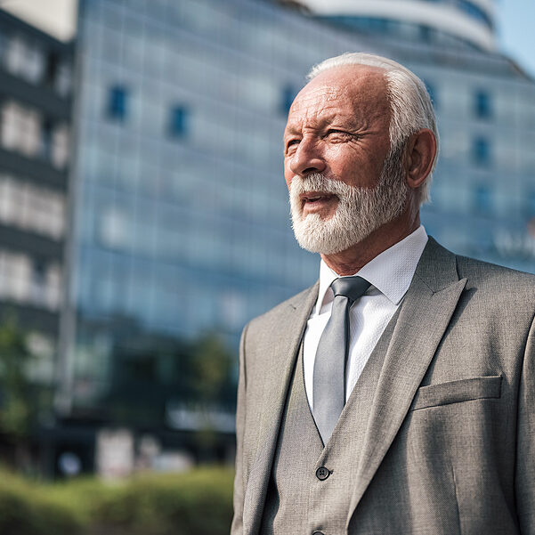 bigstock-Thoughtful-Senior-Businessman-465007431