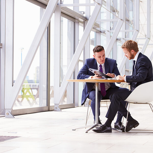 bigstock-Two-business-colleagues-at-mee-101229776