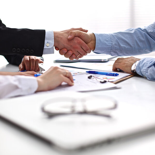 bigstock-Business-meeting-at-the-table-99066275