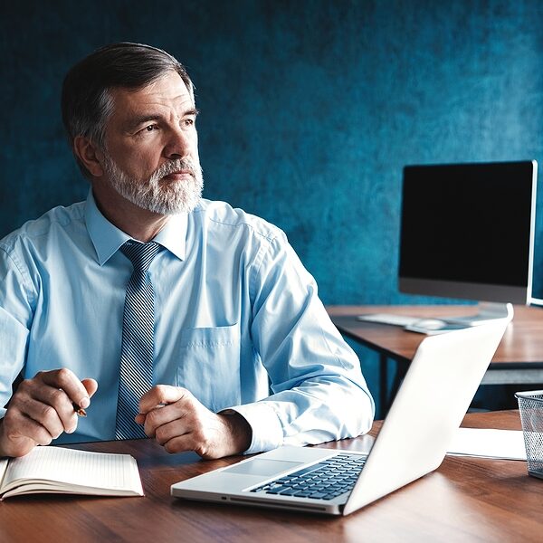 bigstock-Focused-Mature-Businessman-Dee-371184892